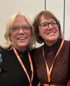 2 white women smiling