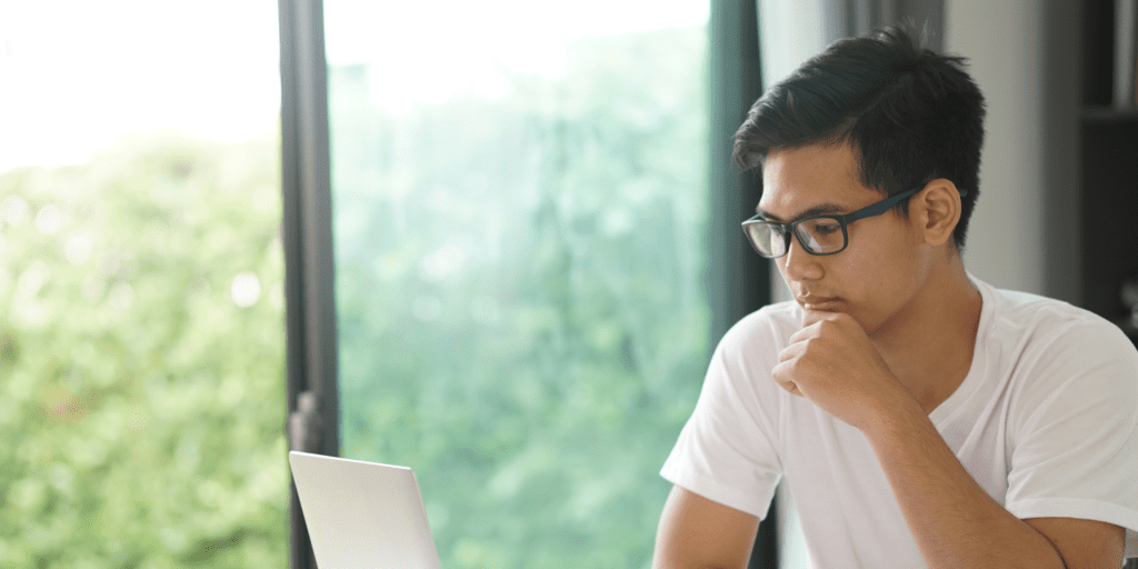 Man looking at laptop